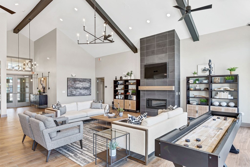 a living room with couches and a table