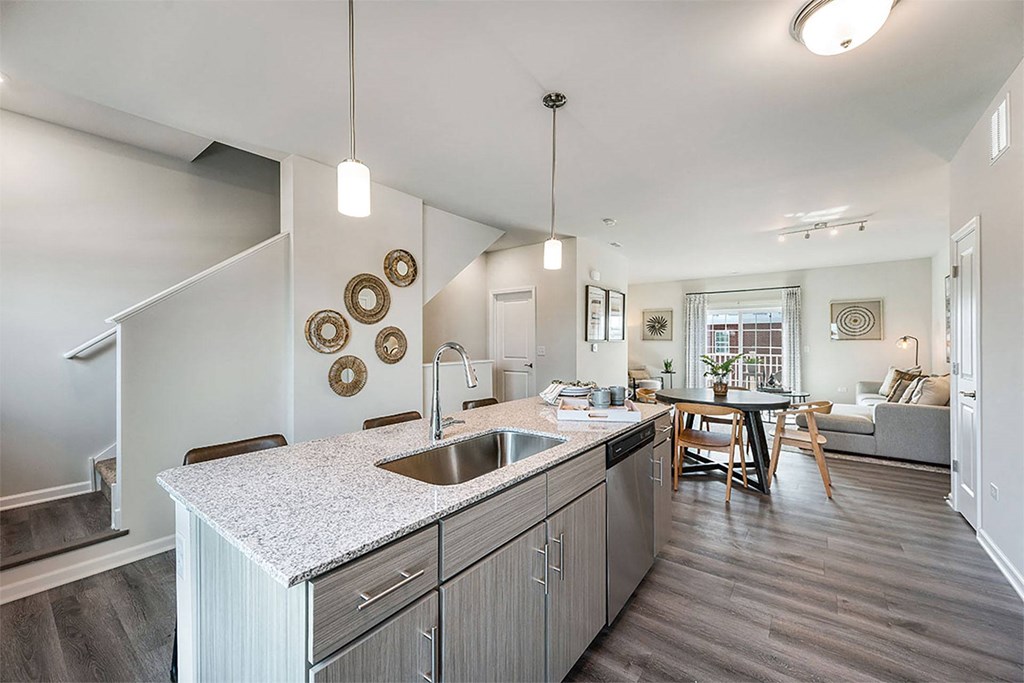a kitchen with a sink and a counter top