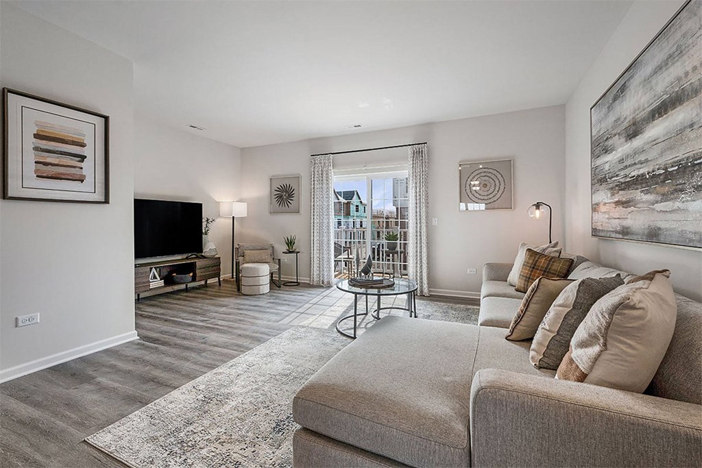 a living room with a couch and a tv