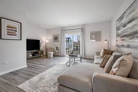 a living room with a couch and a tv