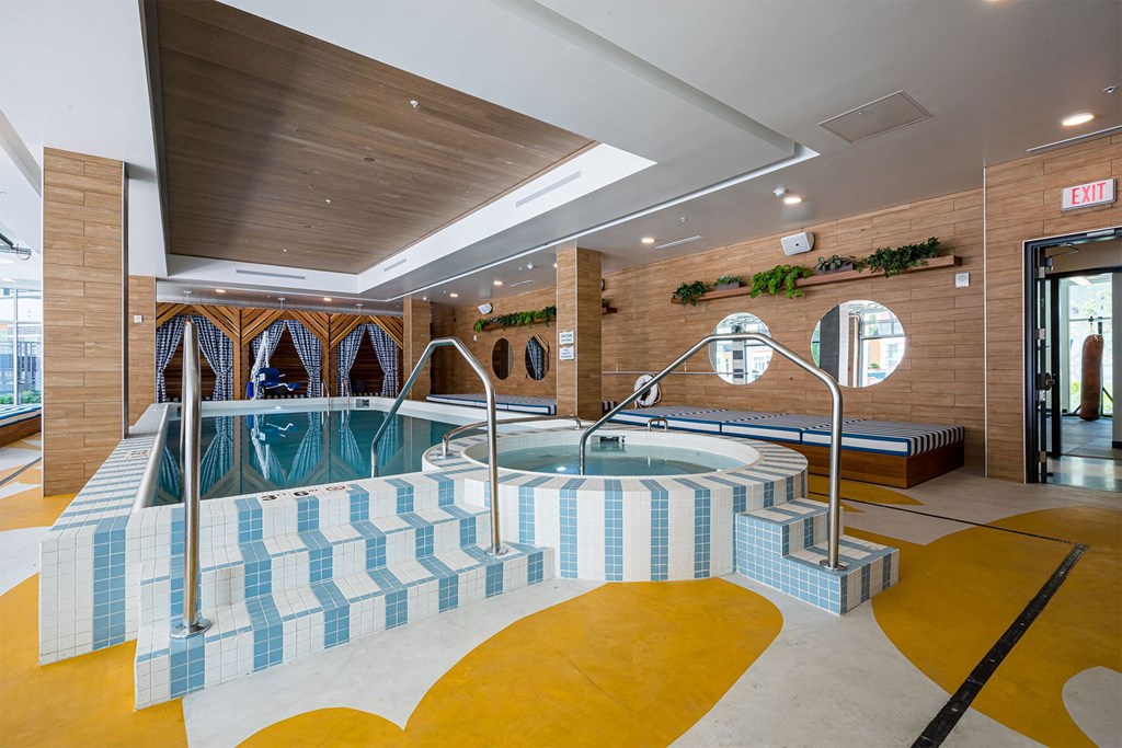 A swimming pool with a staircase leading to it.