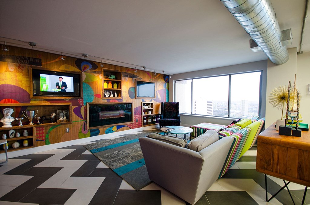 a living room with a couch and a television