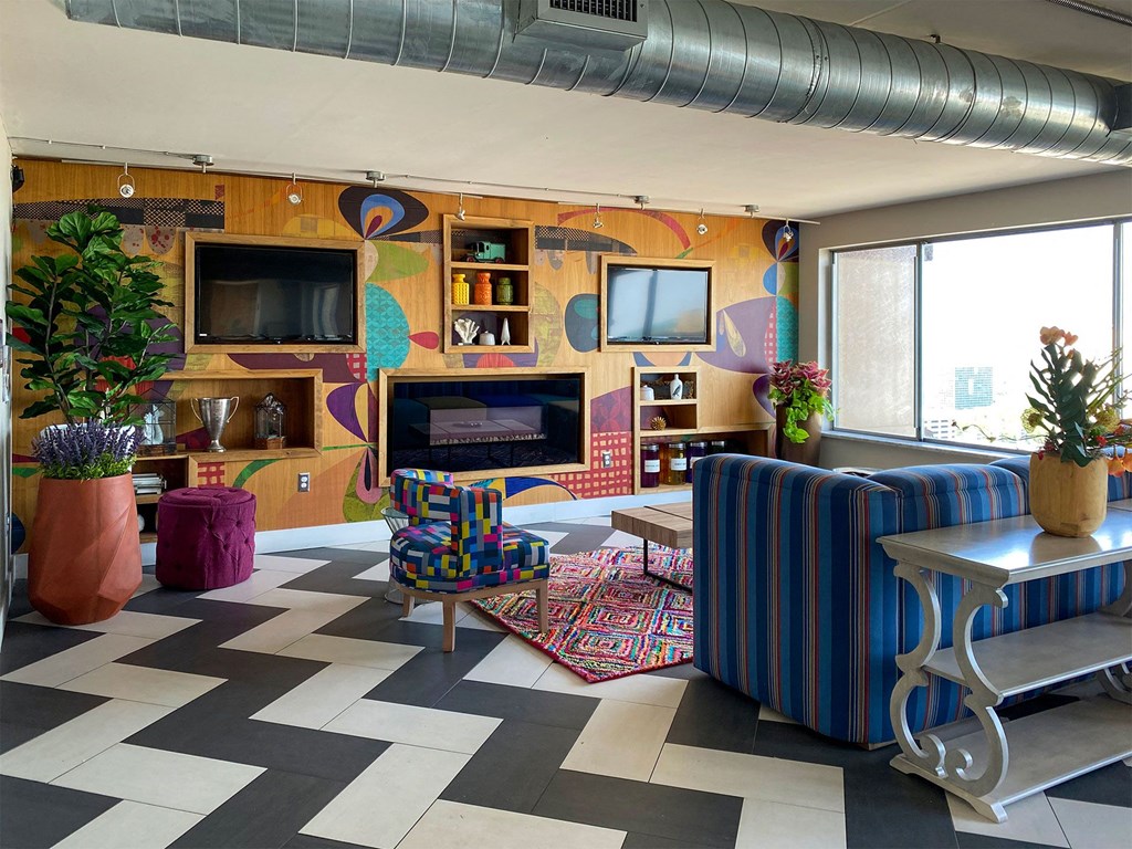 a living room with a couch and a television