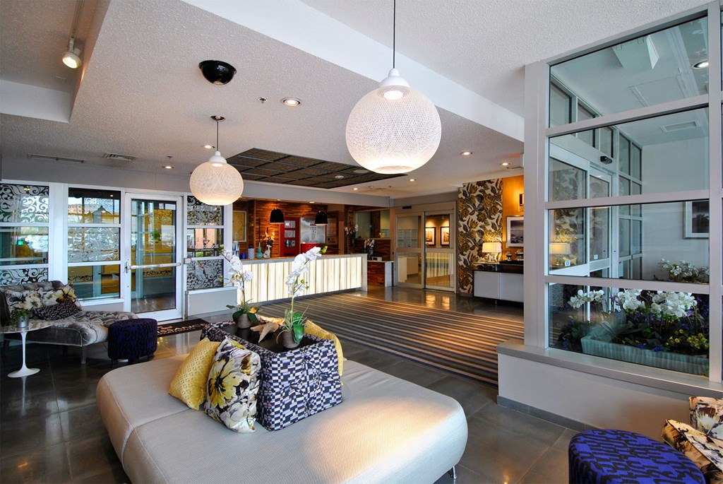 a living room with a couch and some pillows