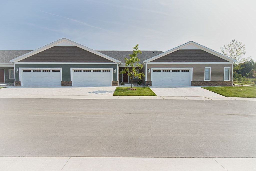 front view of a house with two garage doors