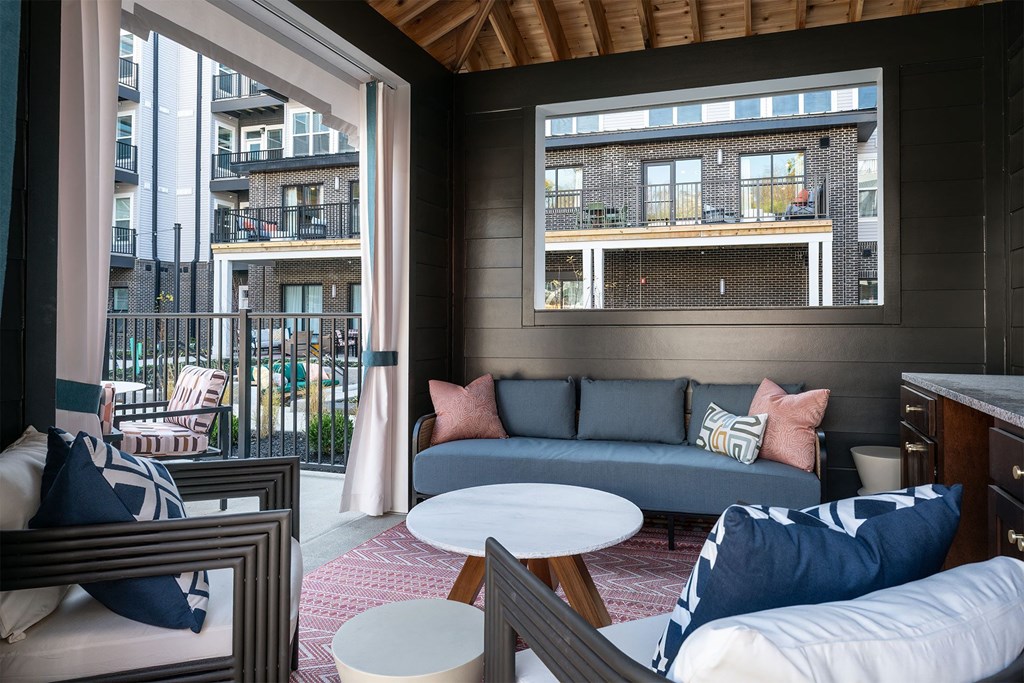 a living room with a couch and a table
