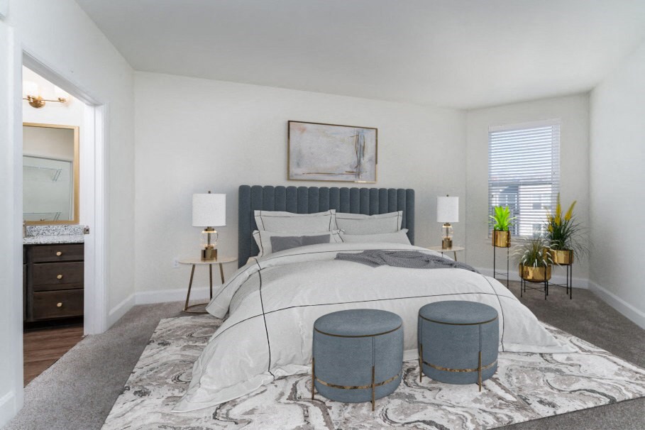 a bedroom with a bed and two stools