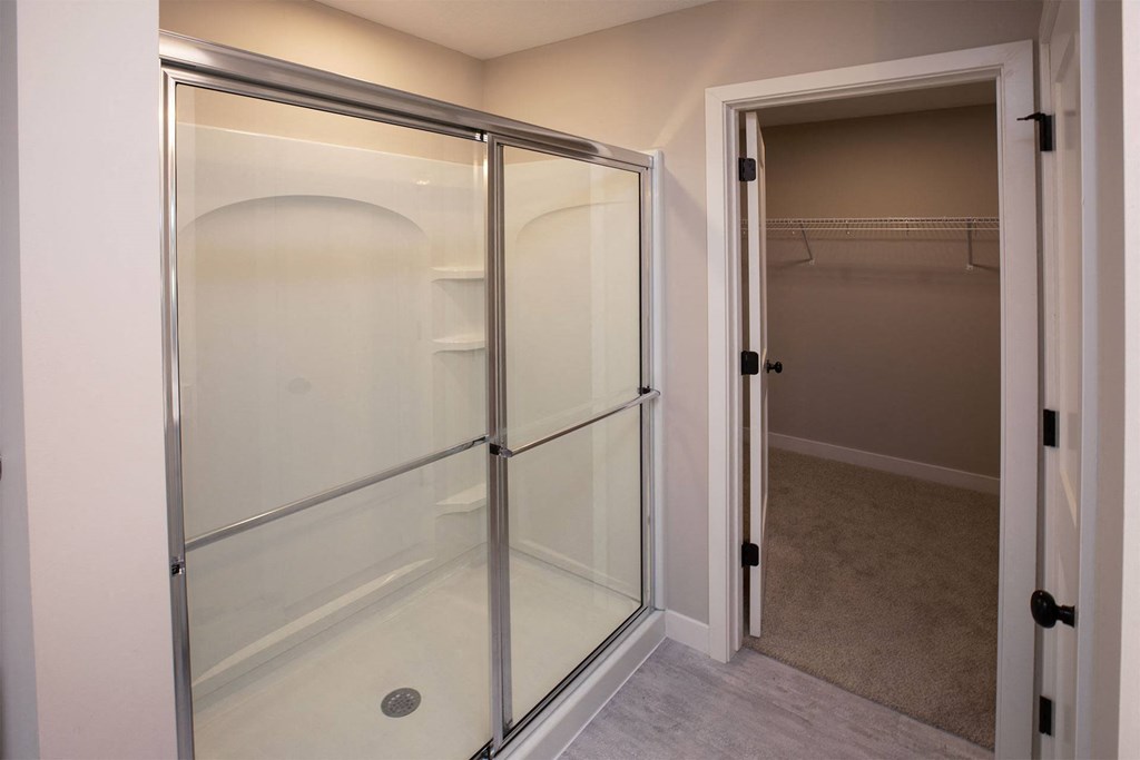 a walk in closet in a 555 waverly unit