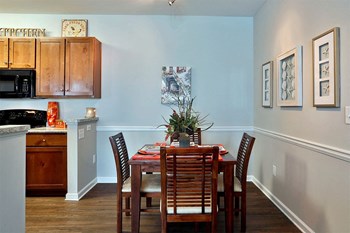 vinings at carolina bays apartments dining area - Photo Gallery 5