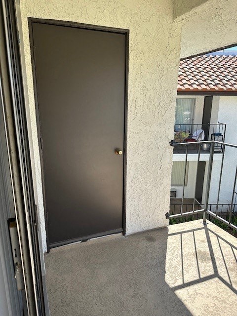 a door that is open to a balcony