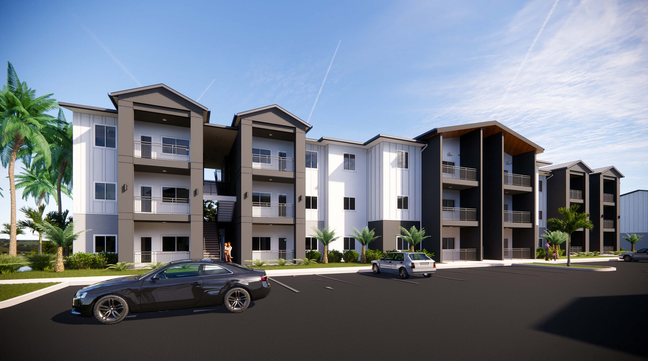 a rendering of an apartment complex with cars parked in front of it