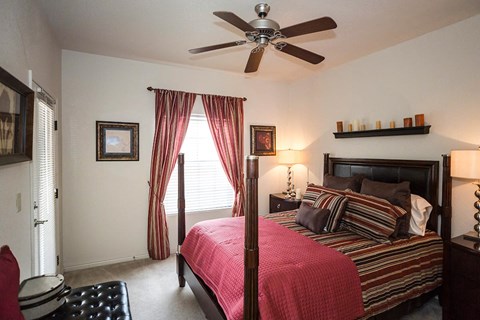 Spacious bedroom with ceiling fans