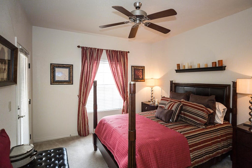 Spacious bedroom with ceiling fans
