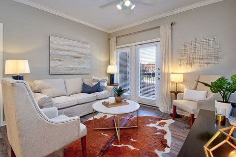 a living room with a couch and a table