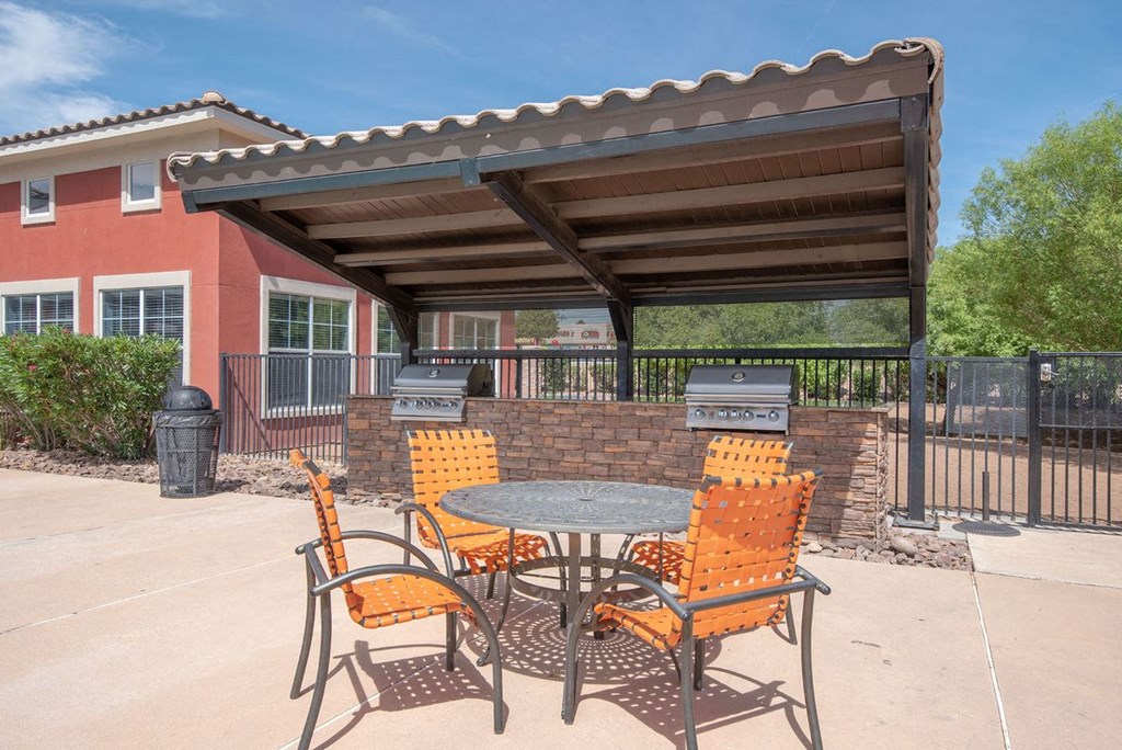 outdoor seating and eating area with shade
