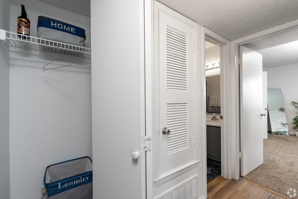 A white door with a sign that says "HOME" on it.