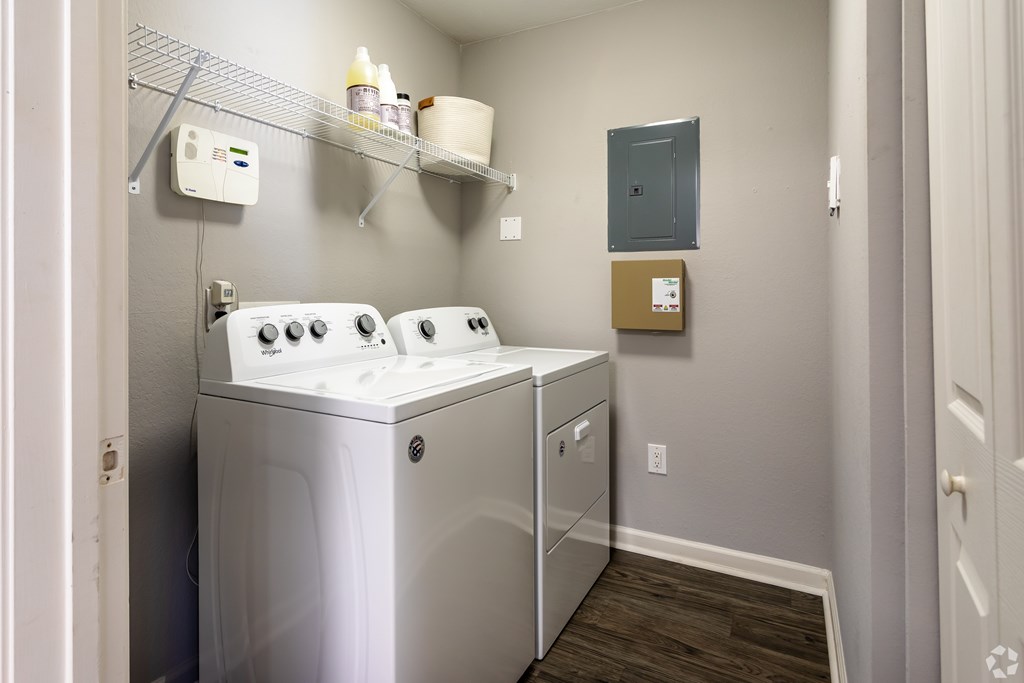 A laundry room with a washer and dryer.