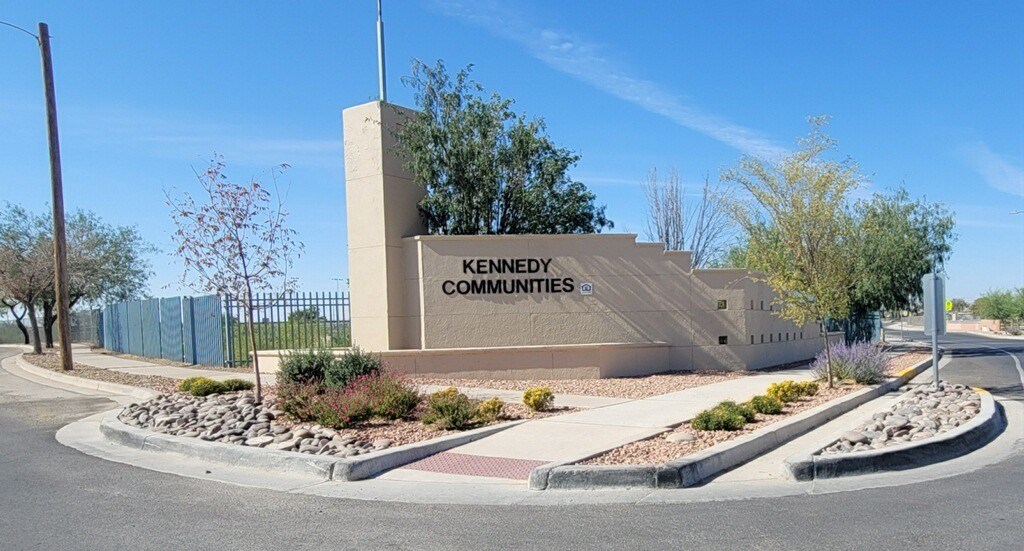 A building with the words "Kennedy Communities" on it.