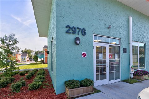 A blue building with the number 2976 on it.