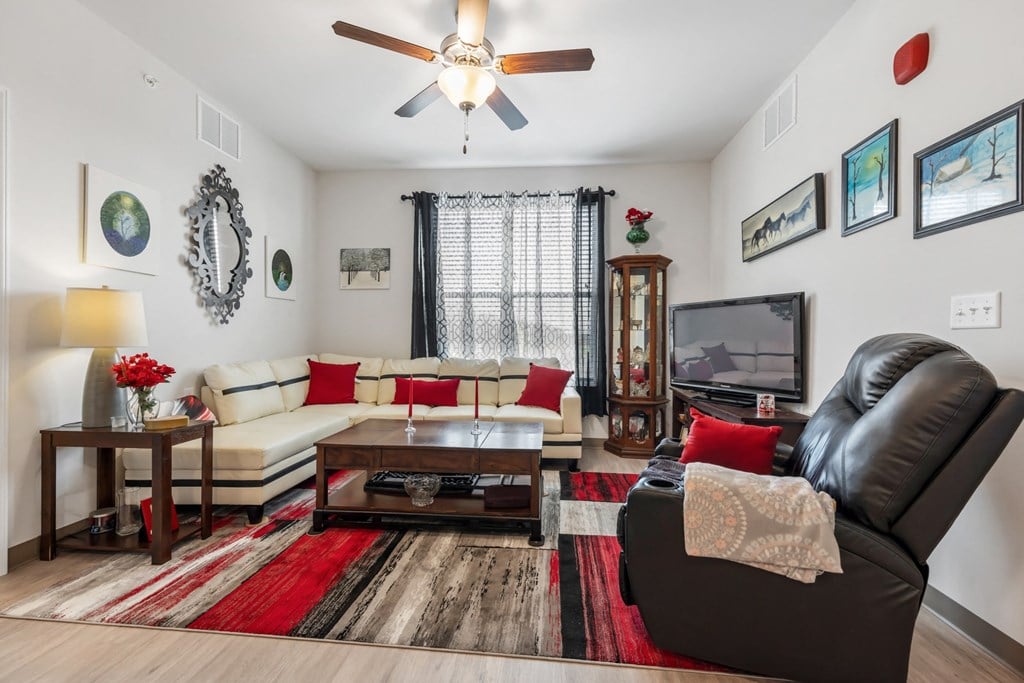 a living room with a couch and a tv