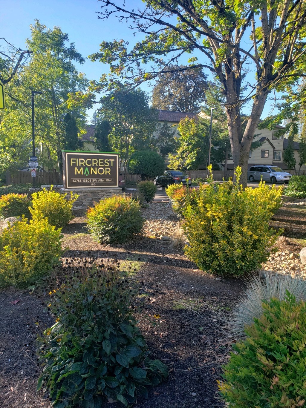 a garden with a sign that reads park