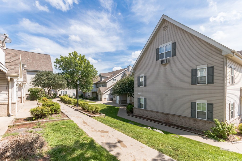 A residential street with houses on both sides.