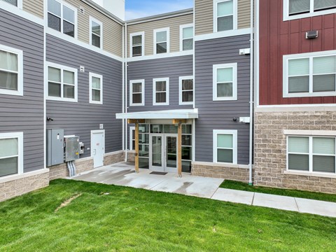 our apartments offer a spacious courtyard with grass