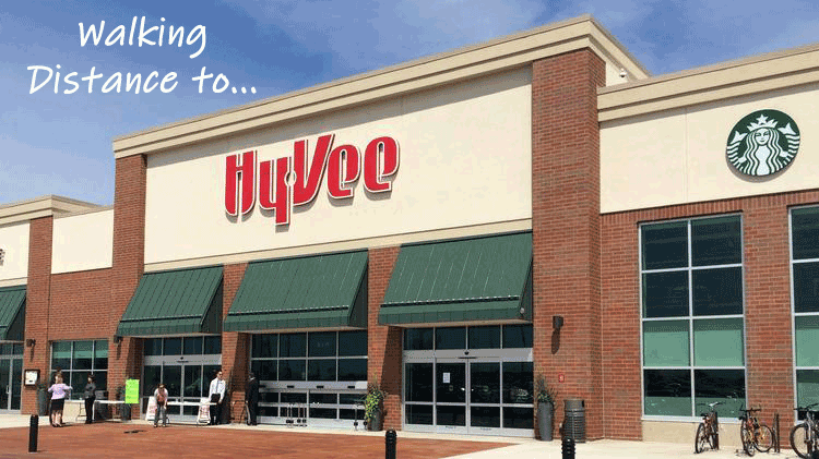 a photo of a hyvee store with a blue sky in the background