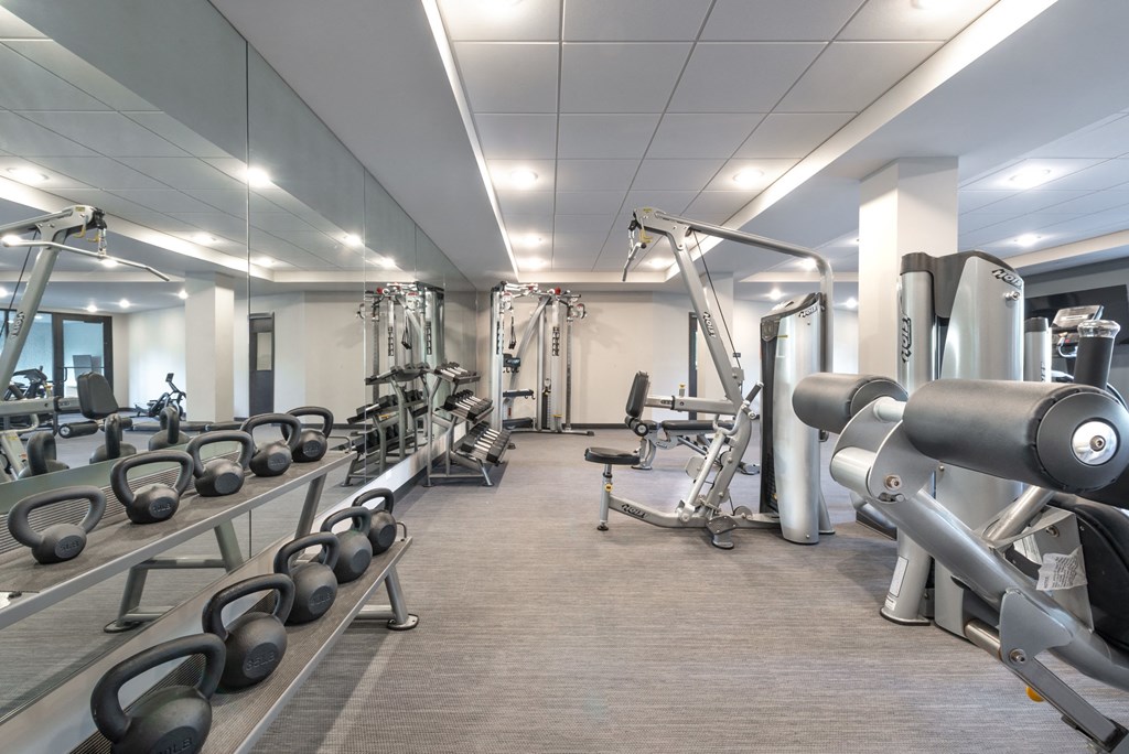 a gym with weights and other exercise equipment