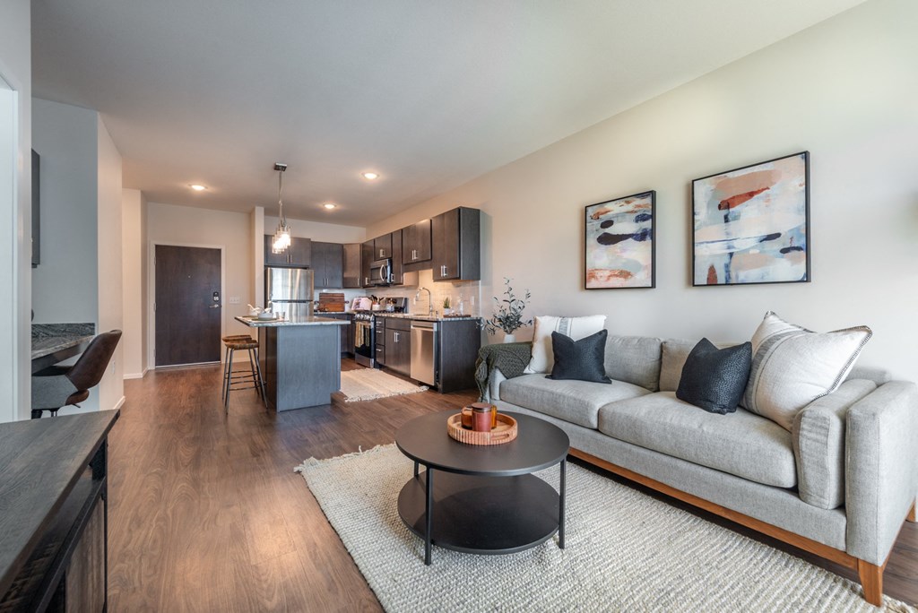 a living room with a couch and a table