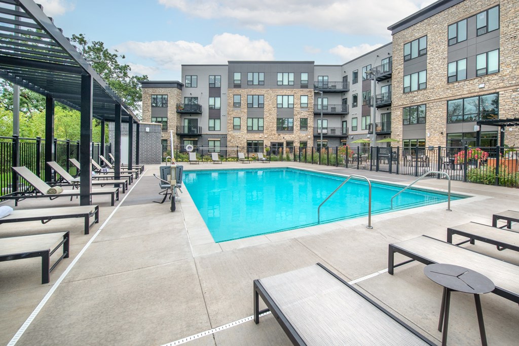 our apartments offer a swimming pool with seating around it
