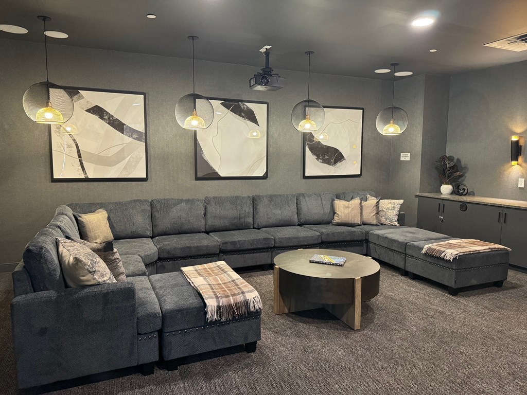 a living room with couches and a coffee table