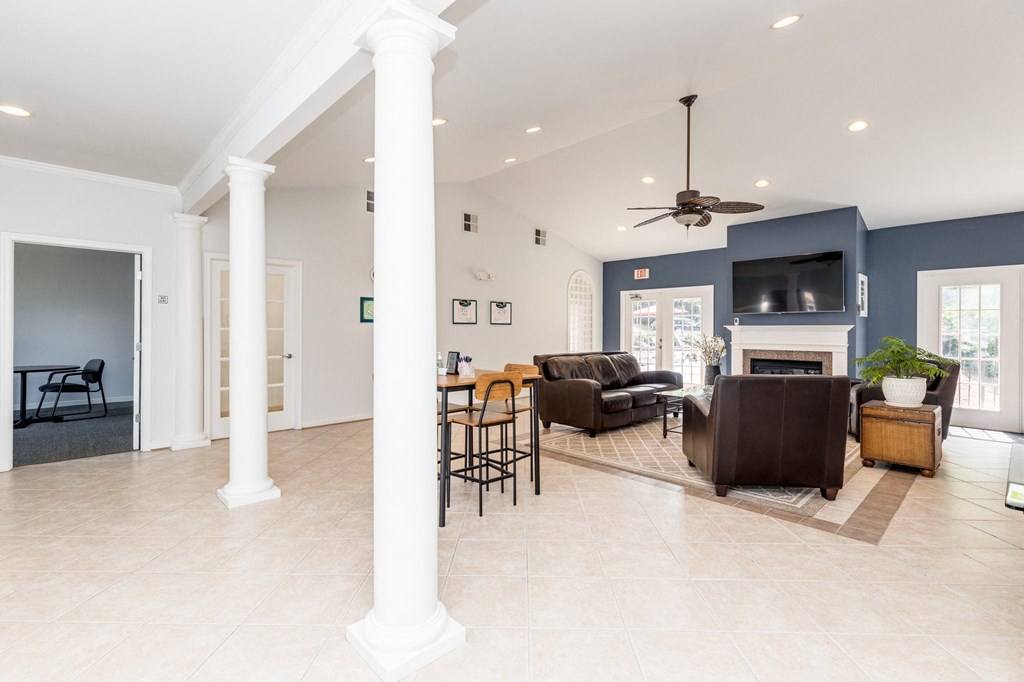 the living room and dining room are open to the kitchen and family room