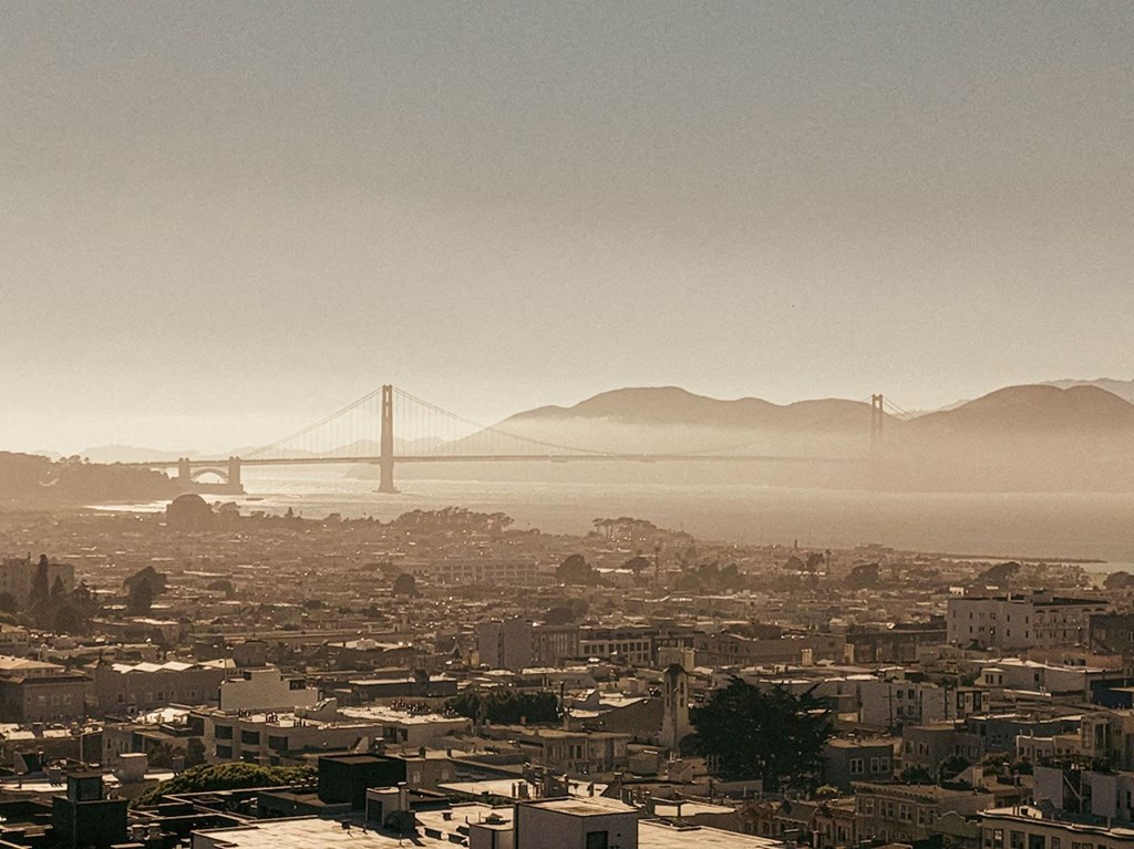 a view of the golden gate bridge from above the city