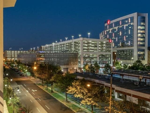 nighttime view of downtown at Flats on 4th Apartments in Birmingham, AL