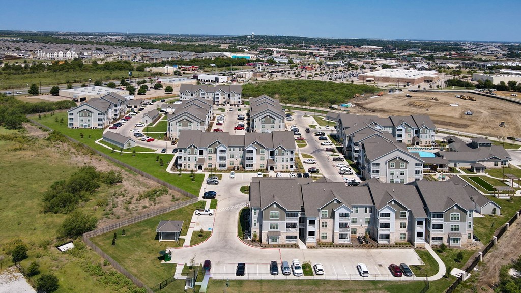 an aerial view of a large apartment complex