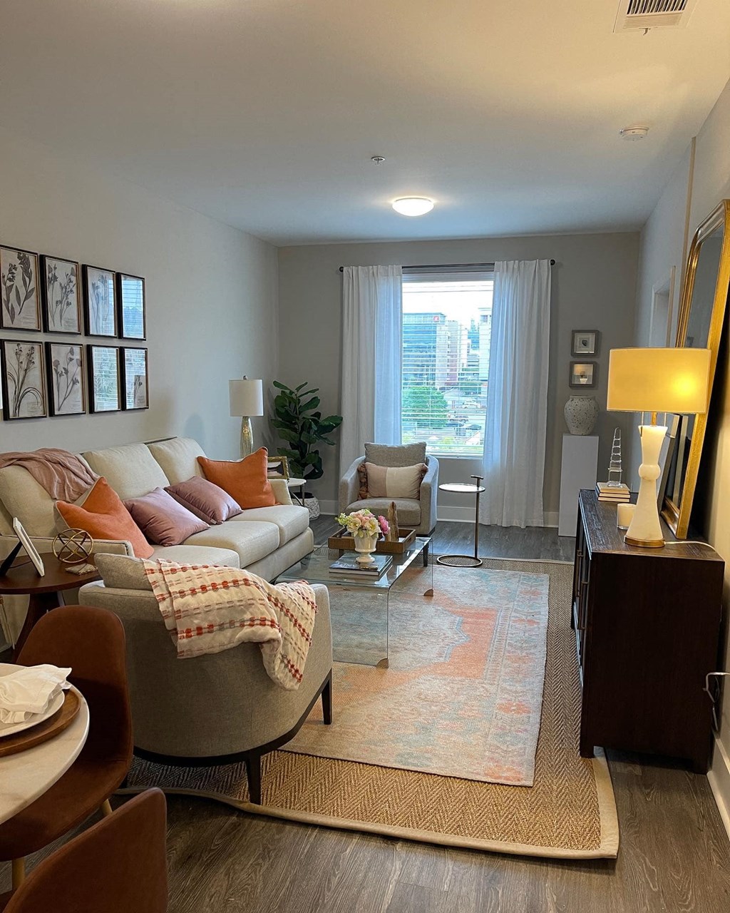 Open concept living area with patio access at Flats on 4th Apartments in Birmingham, AL