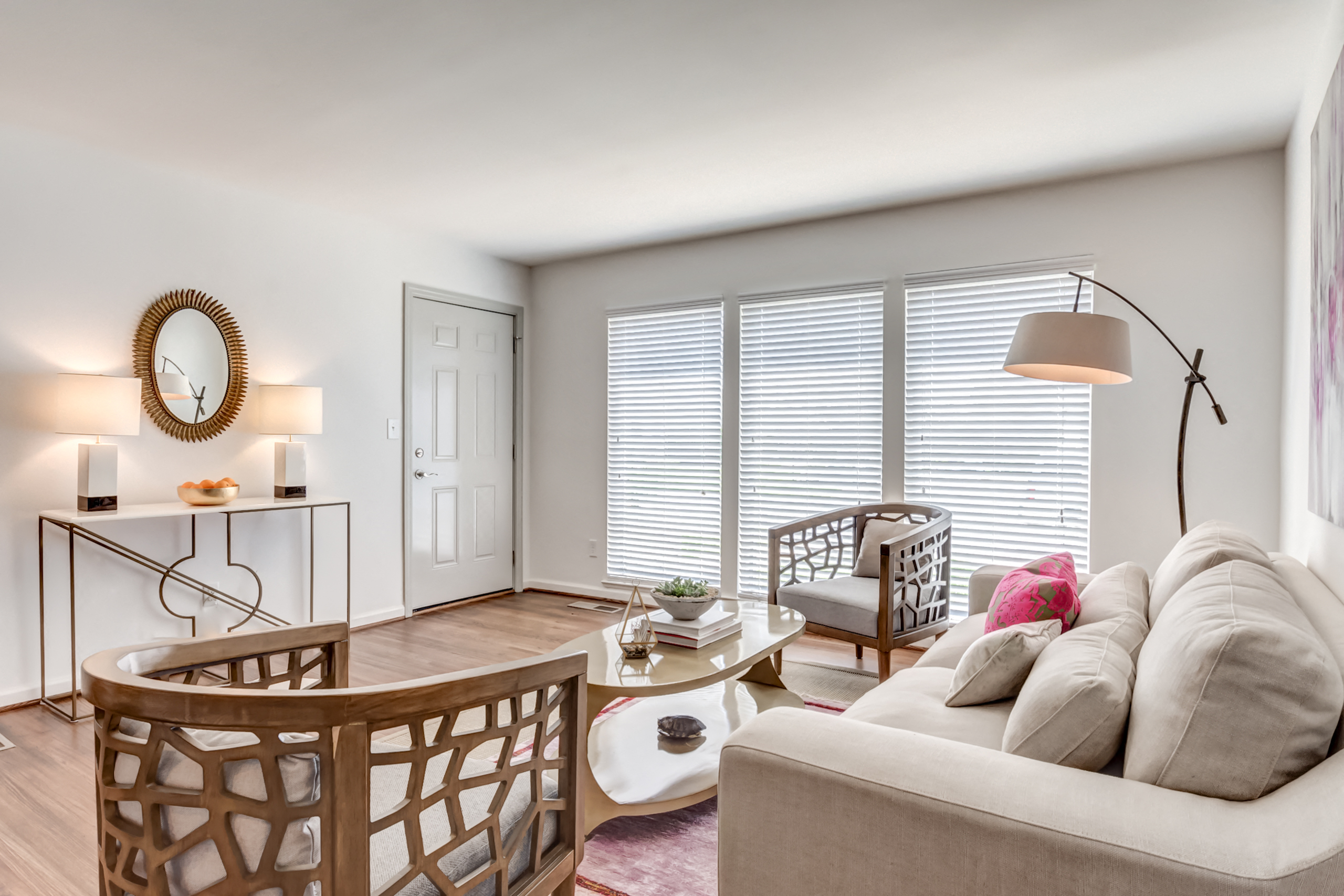 a living room with a couch and a chair