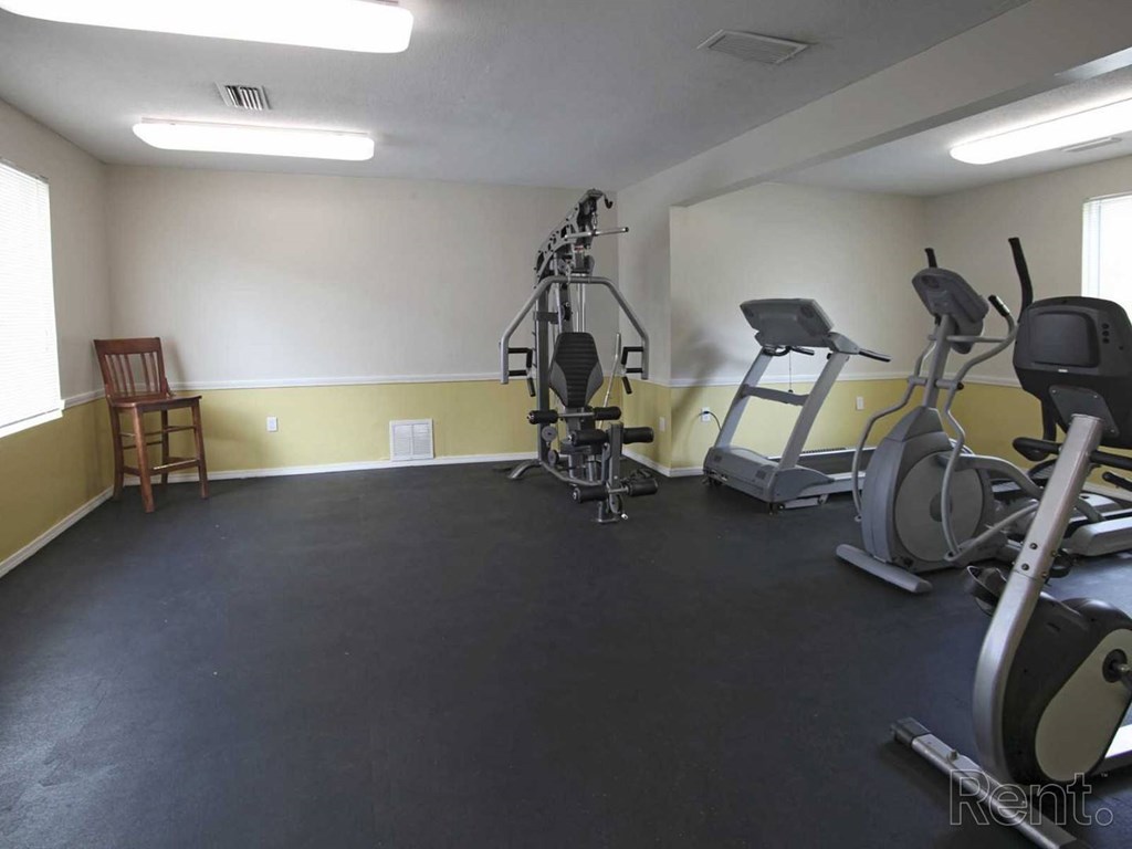 fitness room with cardio and resistance equipment at The Oakley at Hillcrest in Mobile, AL