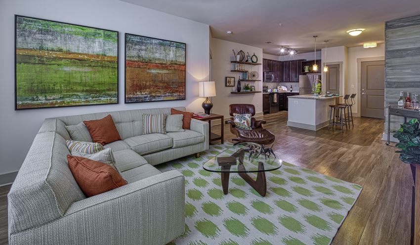 Luxurious furnished living room at 4700 Colonnade apartments with open concept floor plan designs in Vestavia Hills
