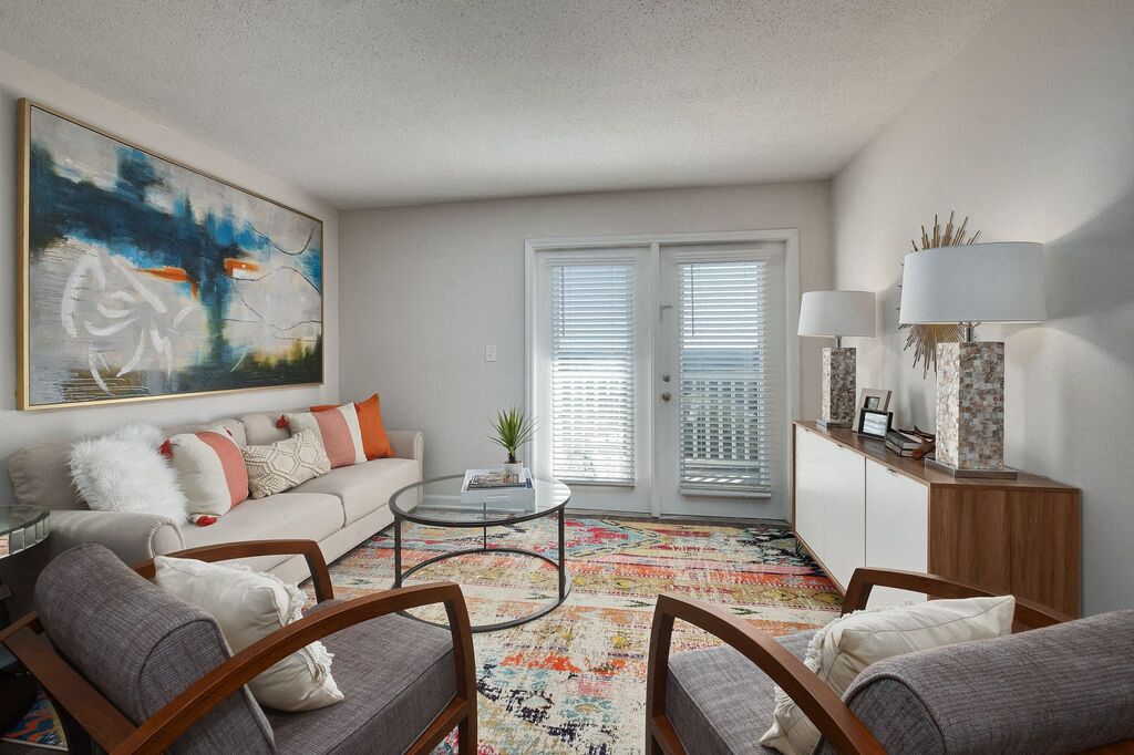 a living room with a couch and a table