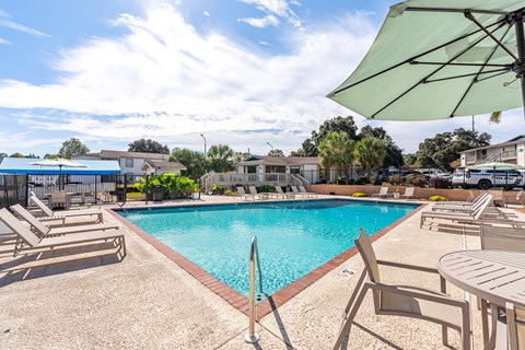 sparkling pool and sundeck at 701 South Apartments in Mobile, AL