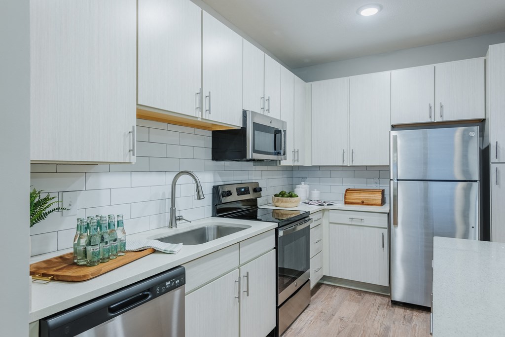 Modern kitchen with subway tile backsplash at Bon Haven Apartments in Spartanburg, SC