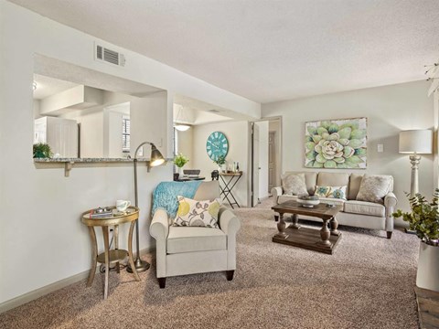 a living room with a couch and a table