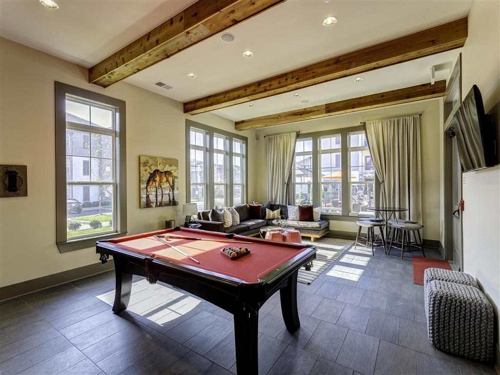 Apartments for Rent in Louisville - SpringHouse - Spacious Club House with Comfy Furniture, Tall Windows, and a Pool Table