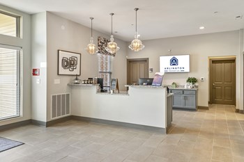 Clubroom with Complimentary Wi-Fi Front Entrance Of Clubhouse Entry At Austin Place Apartments - Photo Gallery 4