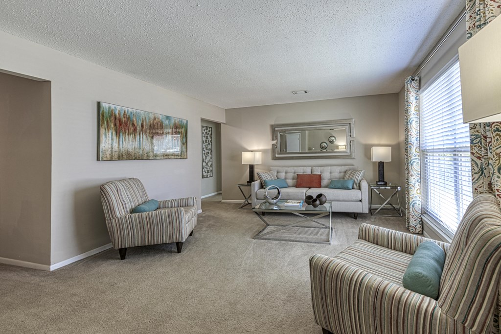living room with large windows at Ascent Jones Apartments in Huntsville, Alabama