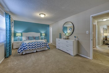 Primary Bedroom with en-suite bath at Ascent Jones Apartments in Huntsville, Alabama - Photo Gallery 7