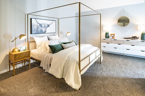 bedroom with natural light and plush carpet at Saddlebrook at Tates Creek Apartments in Lexington, KY
