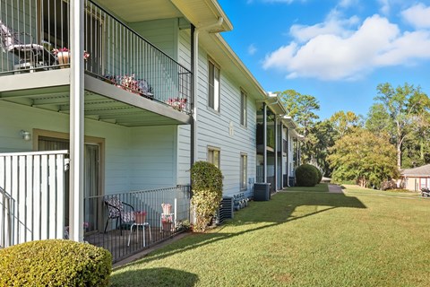 A sunny day at a row of houses with balconies.